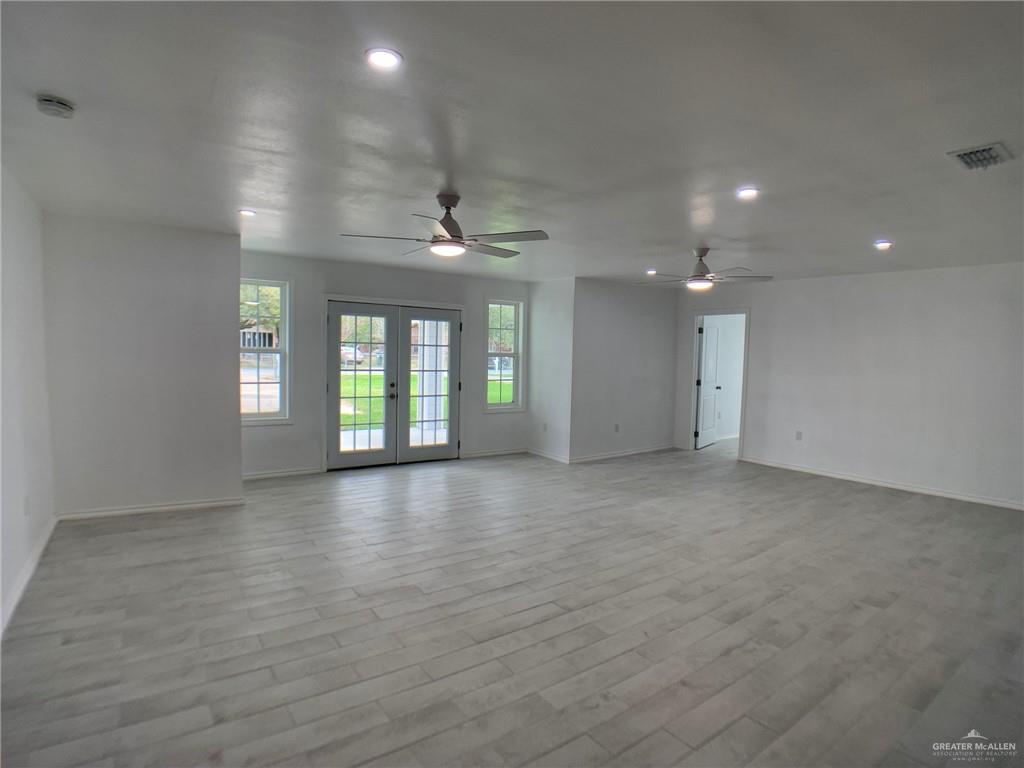 10824 Compadres Street Mercedes, TX 78570 - Photo 8 of 19 a view of an empty room and window