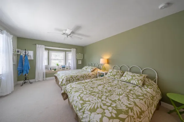 a living room with furniture fireplace and a flat screen tv