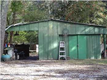 48 Carol Place Freeport, FL 32439 - Photo 5 of 17 a backyard of a house with lots of green space
