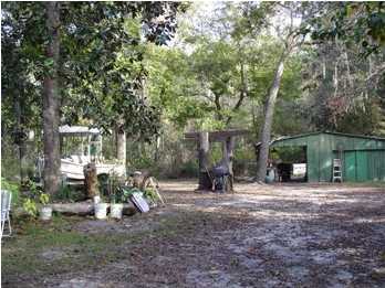 48 Carol Place Freeport, FL 32439 - Photo 6 of 17 a view of a house with backyard