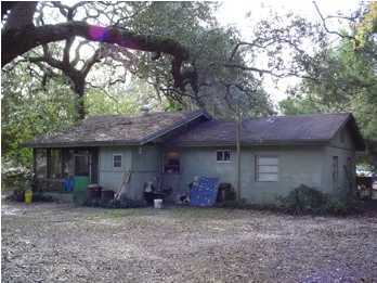 48 Carol Place Freeport, FL 32439 - Photo 8 of 17 a view of a house with a yard