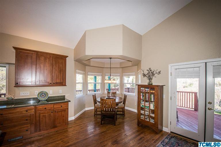 45220 Hammond Drive Three Rivers, CA 93271 - Photo 7 of 31 a kitchen with furniture and wooden floors