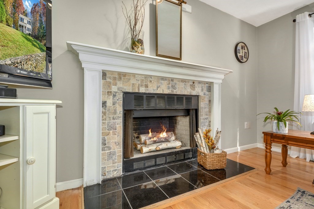 16 Barrett Road Marlborough, MA 01752 - Photo 11 of 41 a living room with furniture and a fireplace