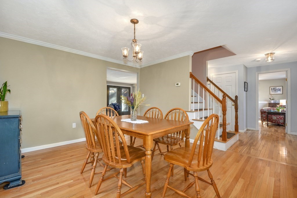 16 Barrett Road Marlborough, MA 01752 - Photo 13 of 41 a view of a dining room with furniture and wooden floor