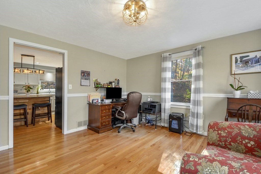 16 Barrett Road Marlborough, MA 01752 - Photo 23 of 41 a view of a livingroom with workspace and a window