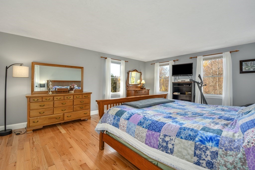 16 Barrett Road Marlborough, MA 01752 - Photo 26 of 41 a bedroom with a bed and a dresser
