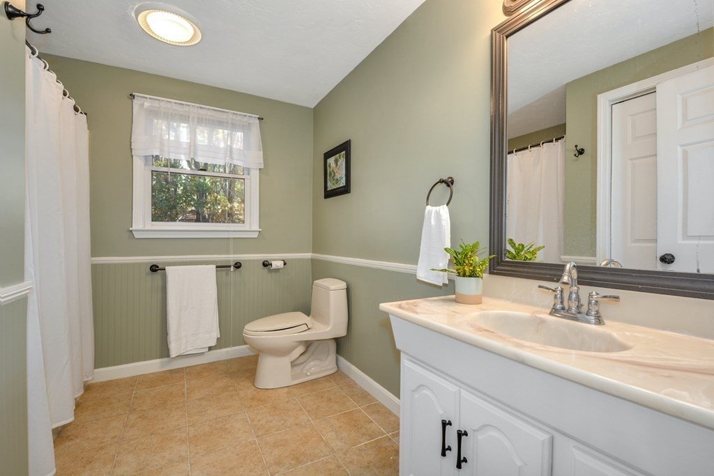 16 Barrett Road Marlborough, MA 01752 - Photo 34 of 41 a bathroom with a sink toilet and a window