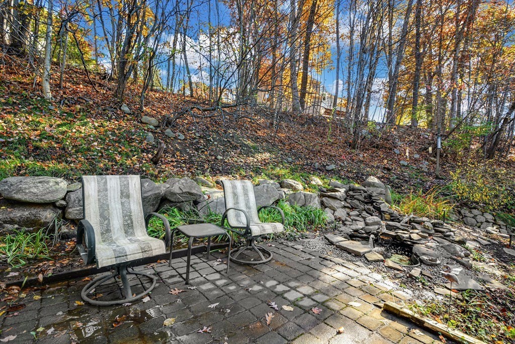 16 Barrett Road Marlborough, MA 01752 - Photo 36 of 41 a backyard of a house with lots of green space