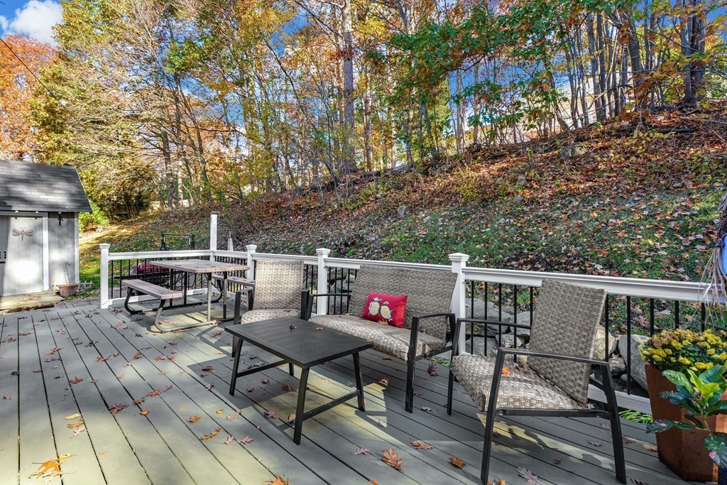 16 Barrett Road Marlborough, MA 01752 - Photo 40 of 41 a roof deck with table and chairs a barbeque with wooden floor and fence