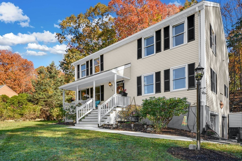 16 Barrett Road Marlborough, MA 01752 - Photo 4 of 41 a front view of a house with a yard