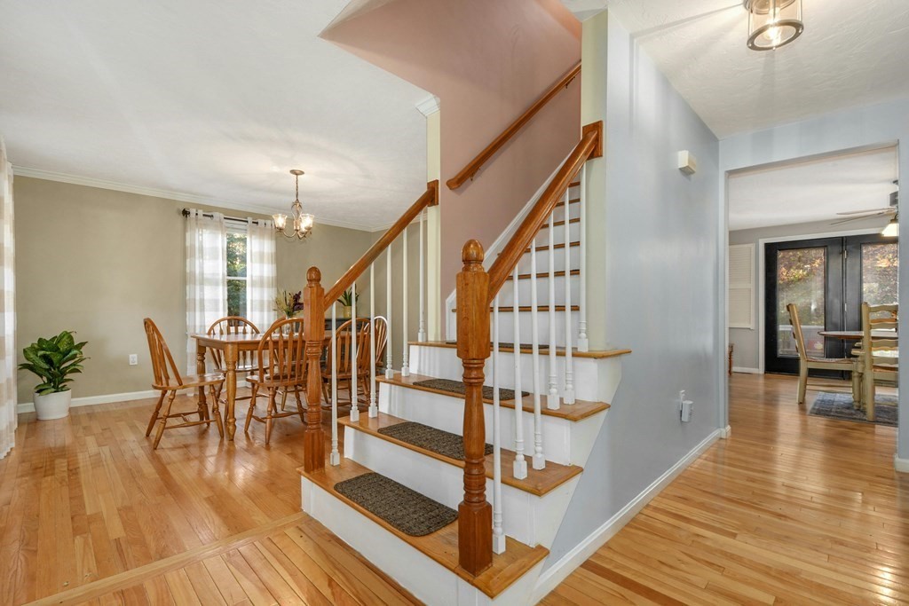 16 Barrett Road Marlborough, MA 01752 - Photo 8 of 41 a view of entryway dining room and hall with wooden floor