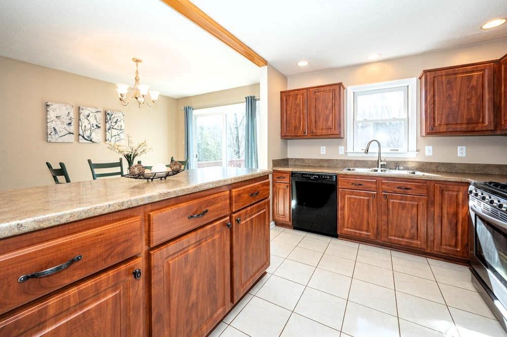24 Lynmar Road Pittsburgh, PA 15209 - Photo 13 of 39 a kitchen with a sink and cabinets