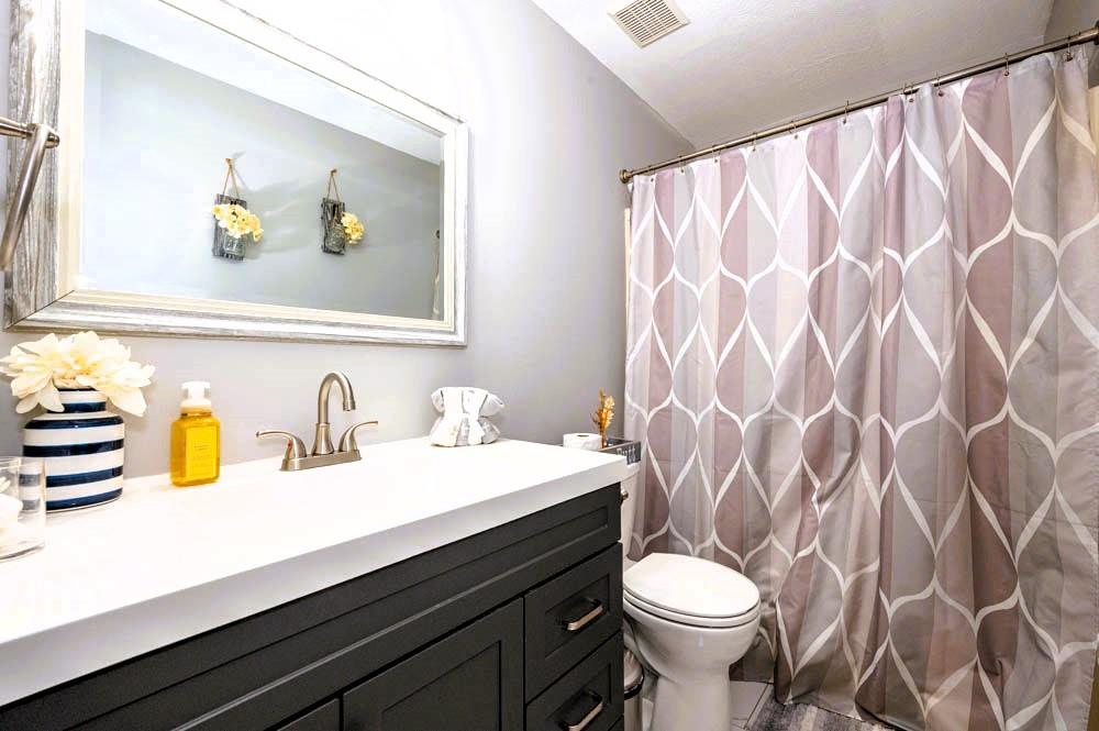 24 Lynmar Road Pittsburgh, PA 15209 - Photo 22 of 39 a bathroom with a sink a mirror and a toilet
