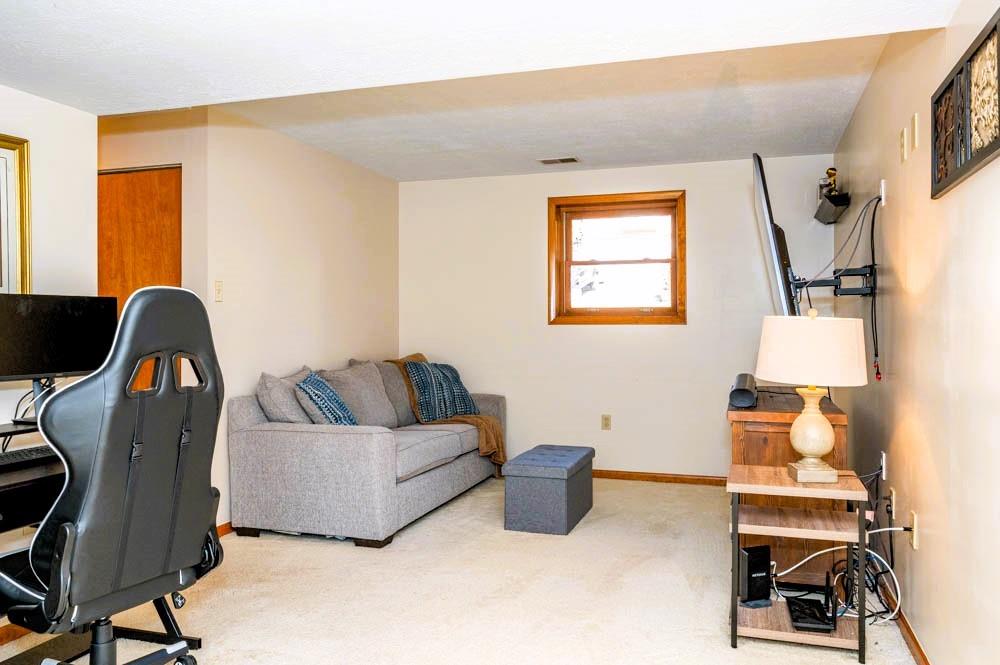 24 Lynmar Road Pittsburgh, PA 15209 - Photo 23 of 39 a living room with furniture and a window