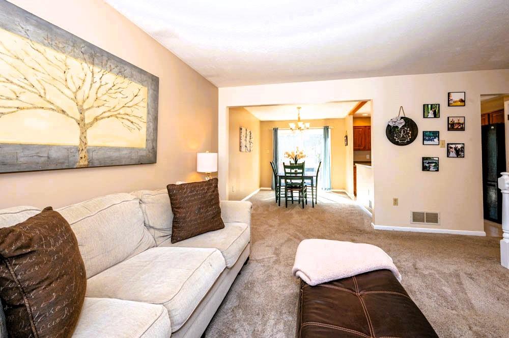24 Lynmar Road Pittsburgh, PA 15209 - Photo 5 of 39 a living room with furniture and a large window