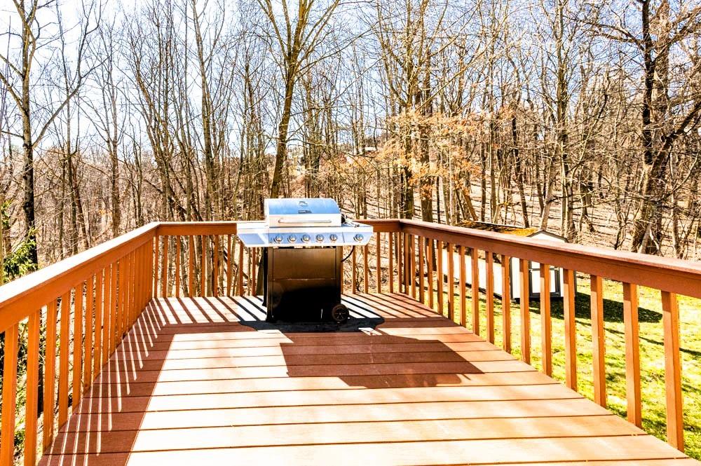 24 Lynmar Road Pittsburgh, PA 15209 - Photo 7 of 39 a view of a balcony with wooden floor and fence