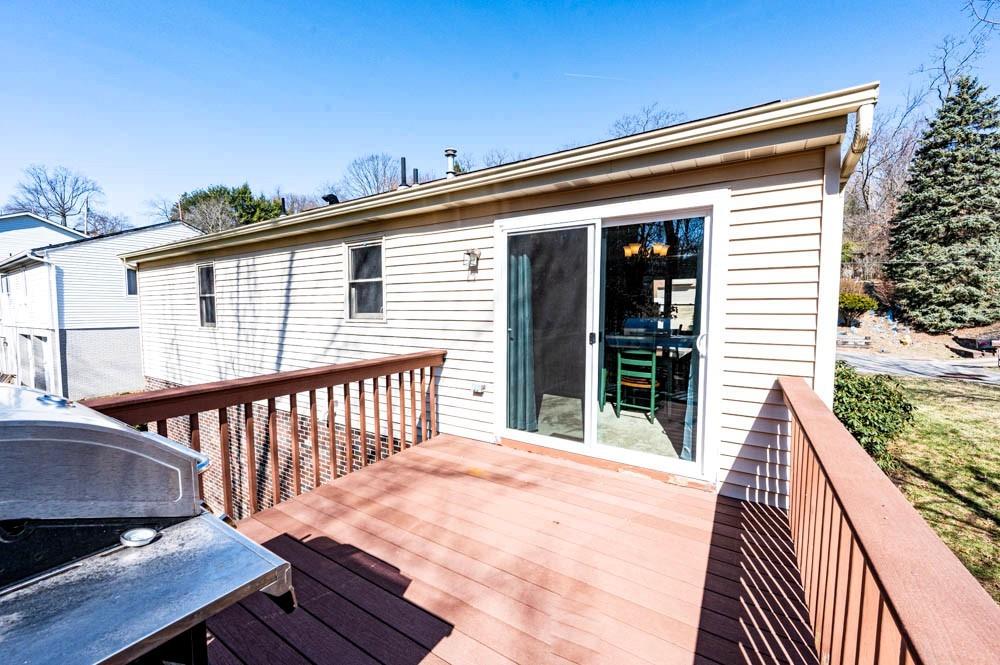 24 Lynmar Road Pittsburgh, PA 15209 - Photo 8 of 39 a view of a roof deck with wooden floor and fence