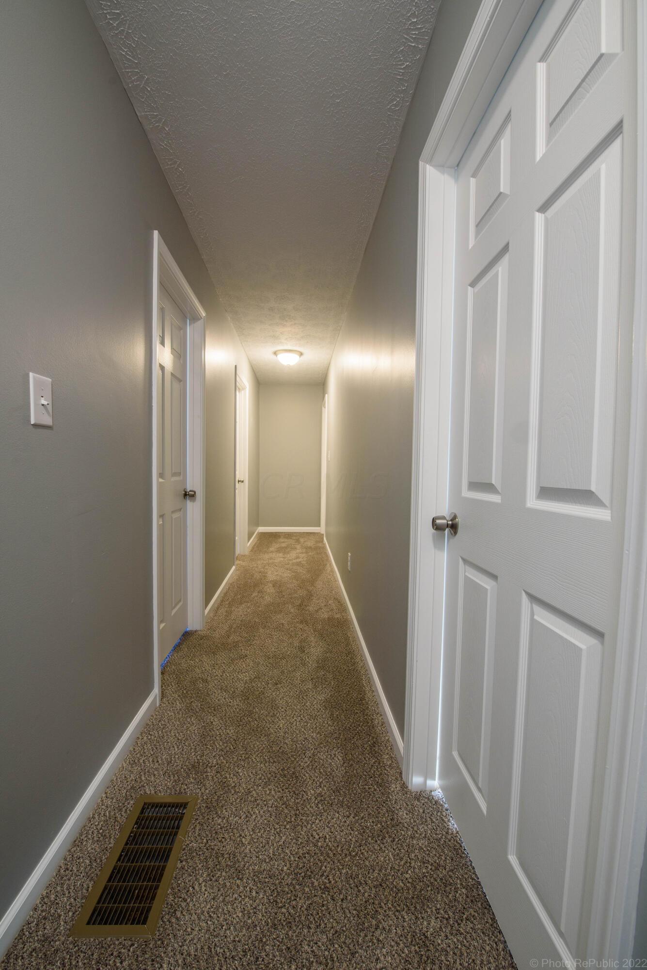 1077 Rumsey Road Columbus, OH 43207 - Photo 14 of 34 Corridor leading to the bedroom upstairs.