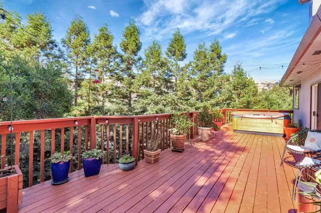 a balcony with wooden floor