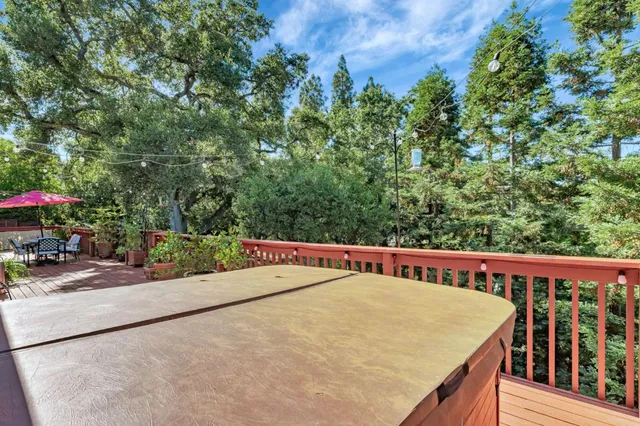 a view of a street with a bench in front of it