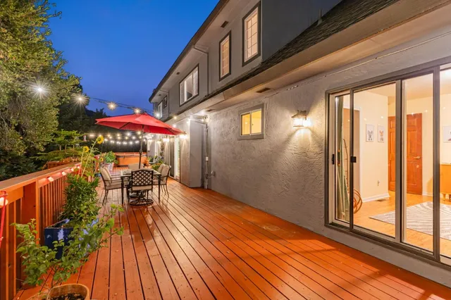 a outdoor space with lots of potted plants