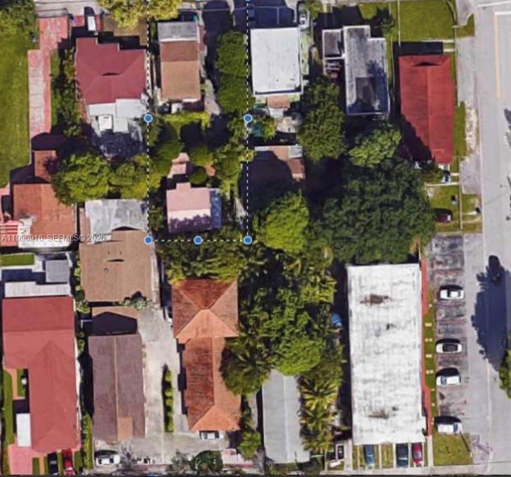 2528 Southwest 16th Street Miami, FL 33145 - Photo 5 of 6 an aerial view of residential houses with outdoor space