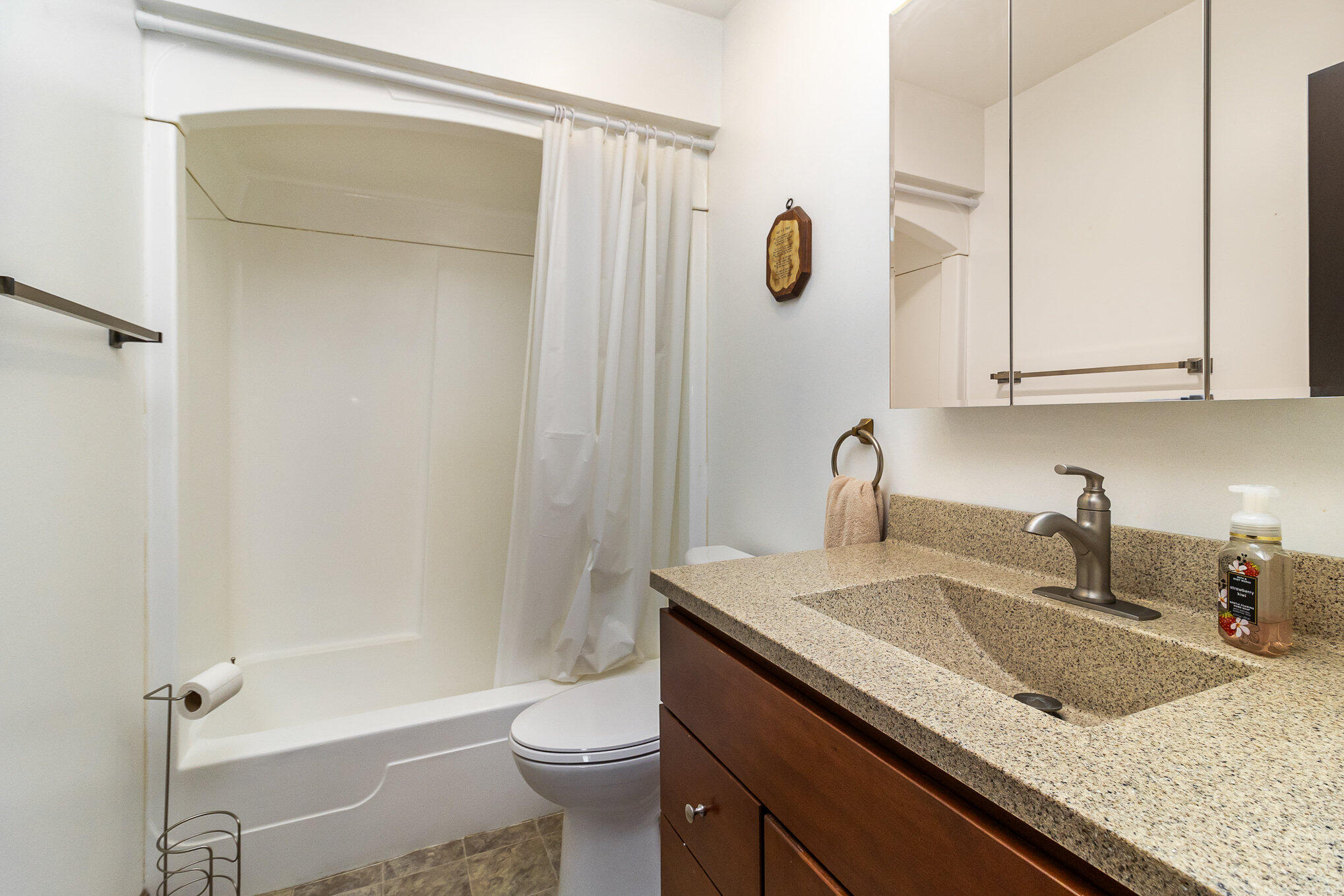 274 Highway 2 Hebron, IN 46341 - Photo 11 of 18 a bathroom with a granite countertop sink a toilet and shower