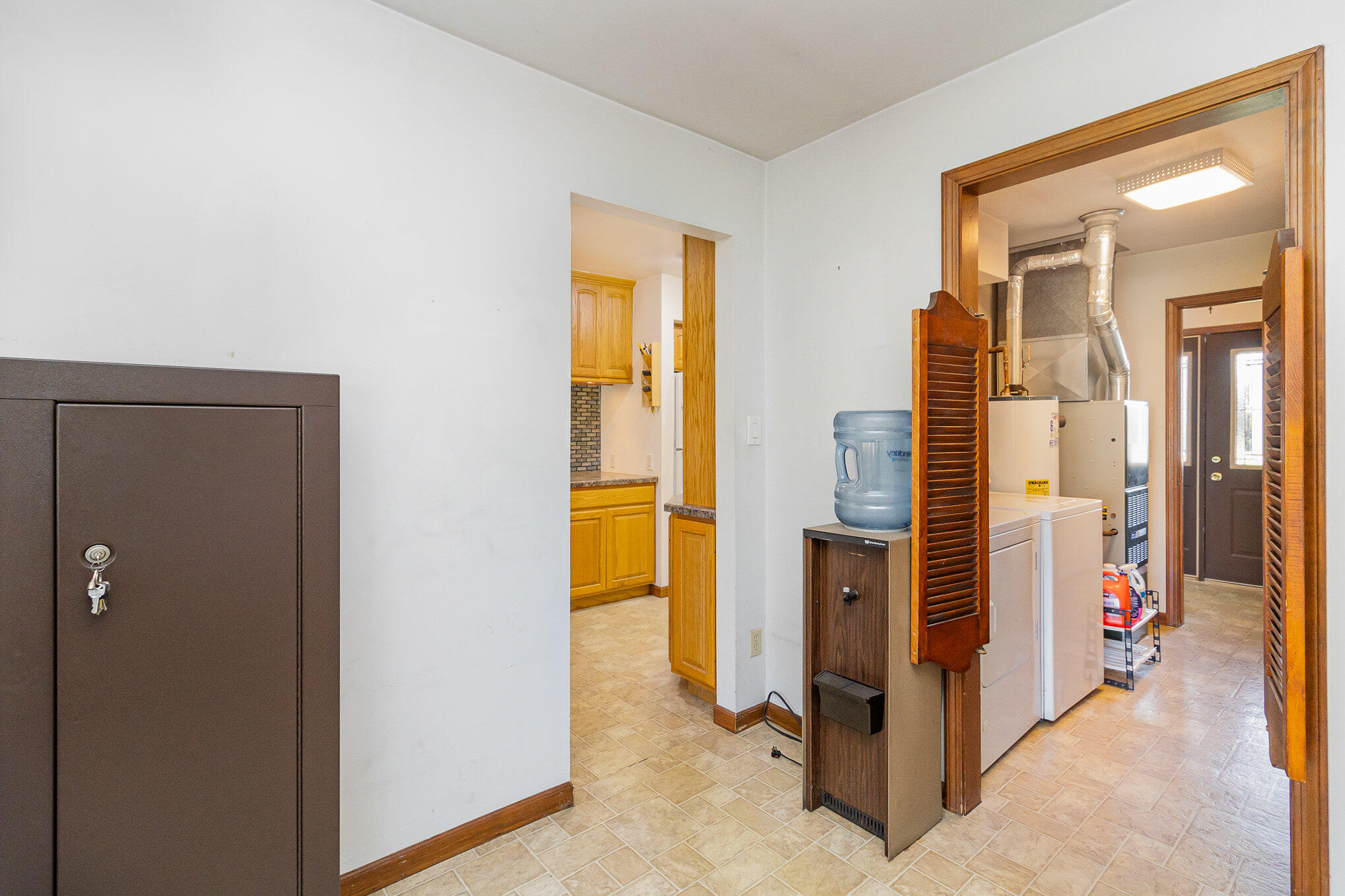 274 Highway 2 Hebron, IN 46341 - Photo 12 of 18 a view of a livingroom with storage & utility room