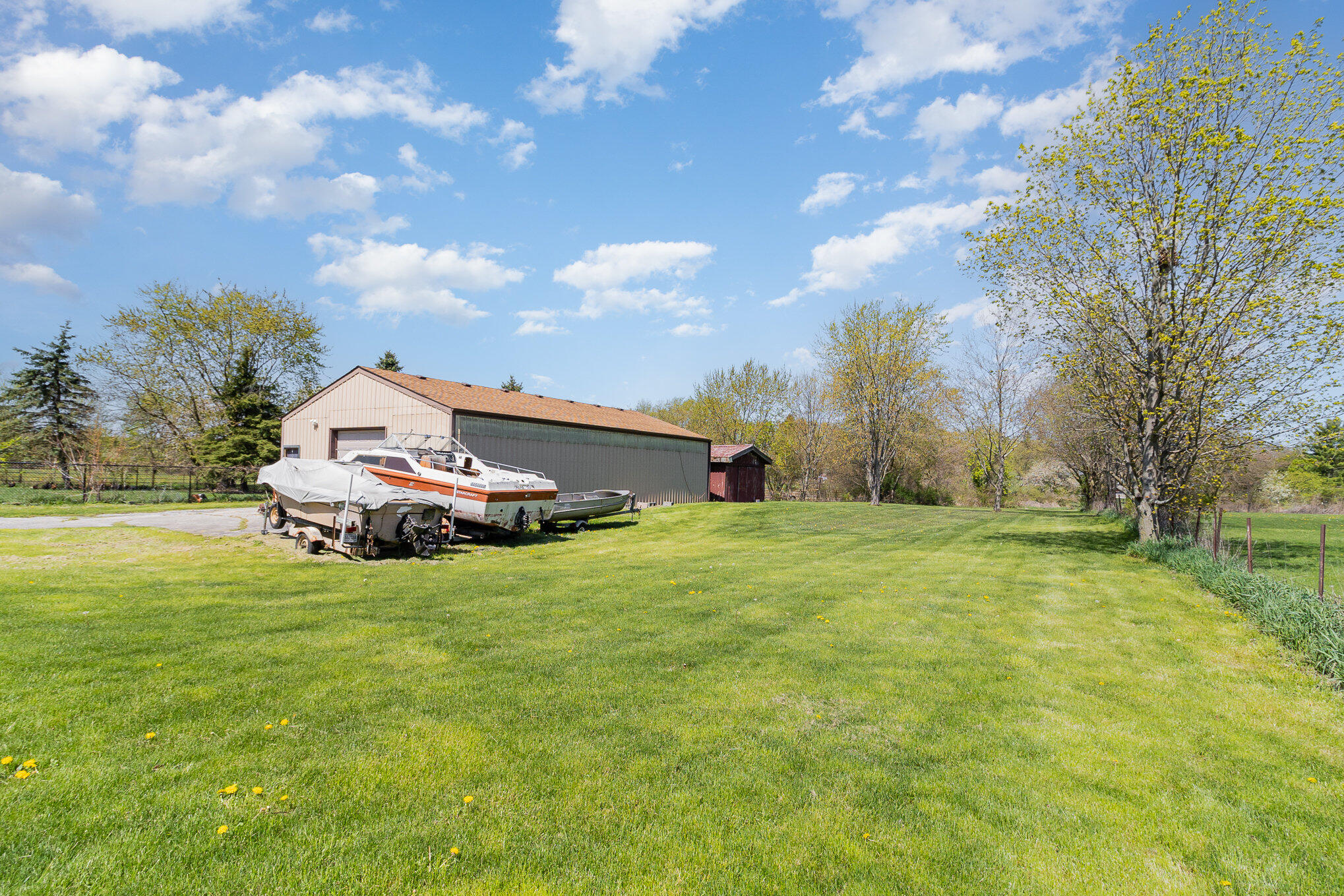 274 Highway 2 Hebron, IN 46341 - Photo 16 of 18 a view of a house with a back yard