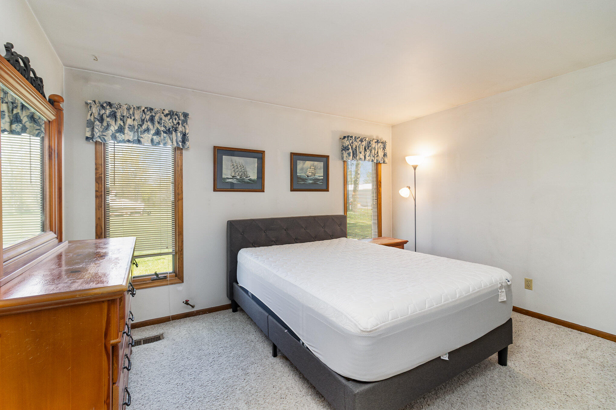 274 Highway 2 Hebron, IN 46341 - Photo 9 of 18 a bedroom with a bed and a window