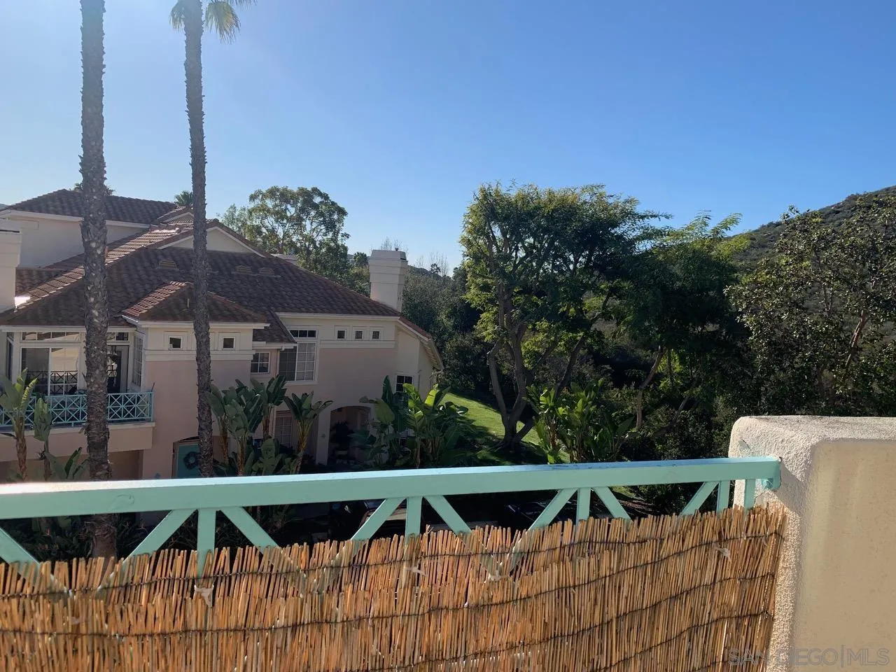 12602 Springbrook Drive, Unit B San Diego, CA 92128 - Photo 26 of 27 a view of outdoor sitting area with furniture and wooden floor