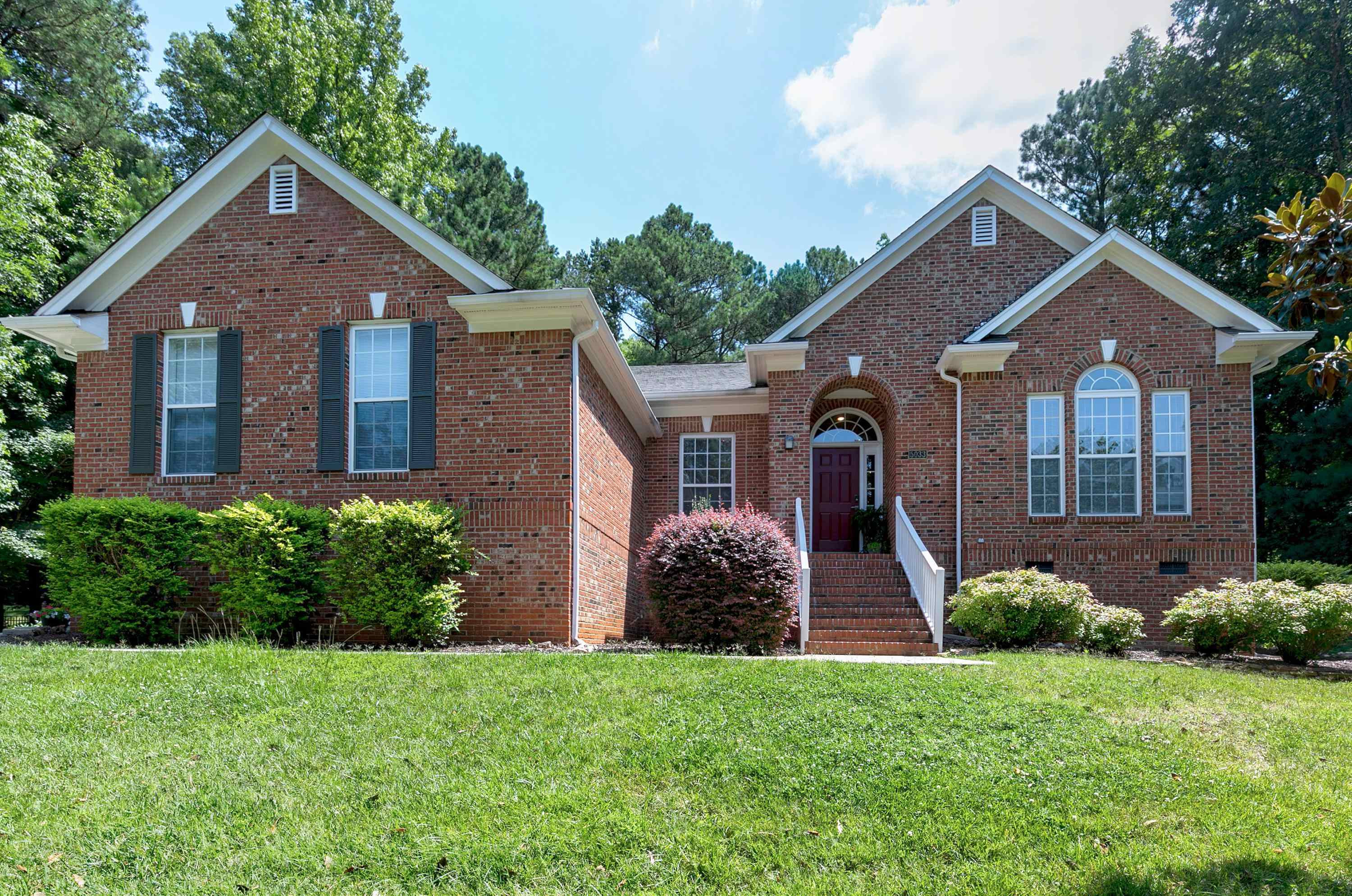 5033 Bartons Enclave Lane Raleigh, NC 27613 - Photo 1 of 58 Beautiful brick front ranch home with a fenced in backyard featuring a screened in porch and patio. Exterior Front