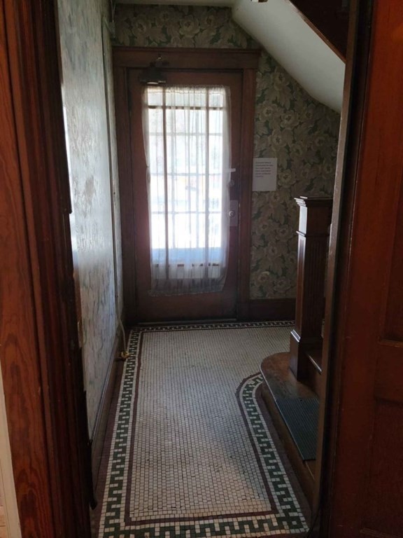 57 Austin Street, Unit 2 Boston, MA 02136 - Photo 2 of 17 a bathroom with a sink and a mirror