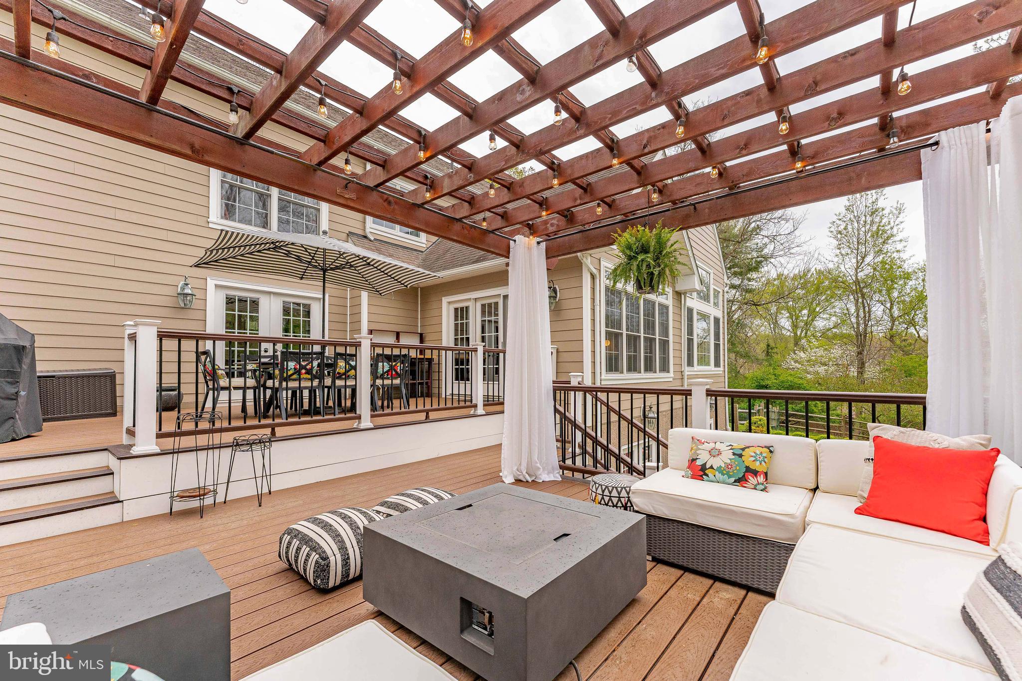 258 New Darlington Road Media, PA 19063 - Photo 107 of 120 a view of a patio with couches chairs and wooden floor