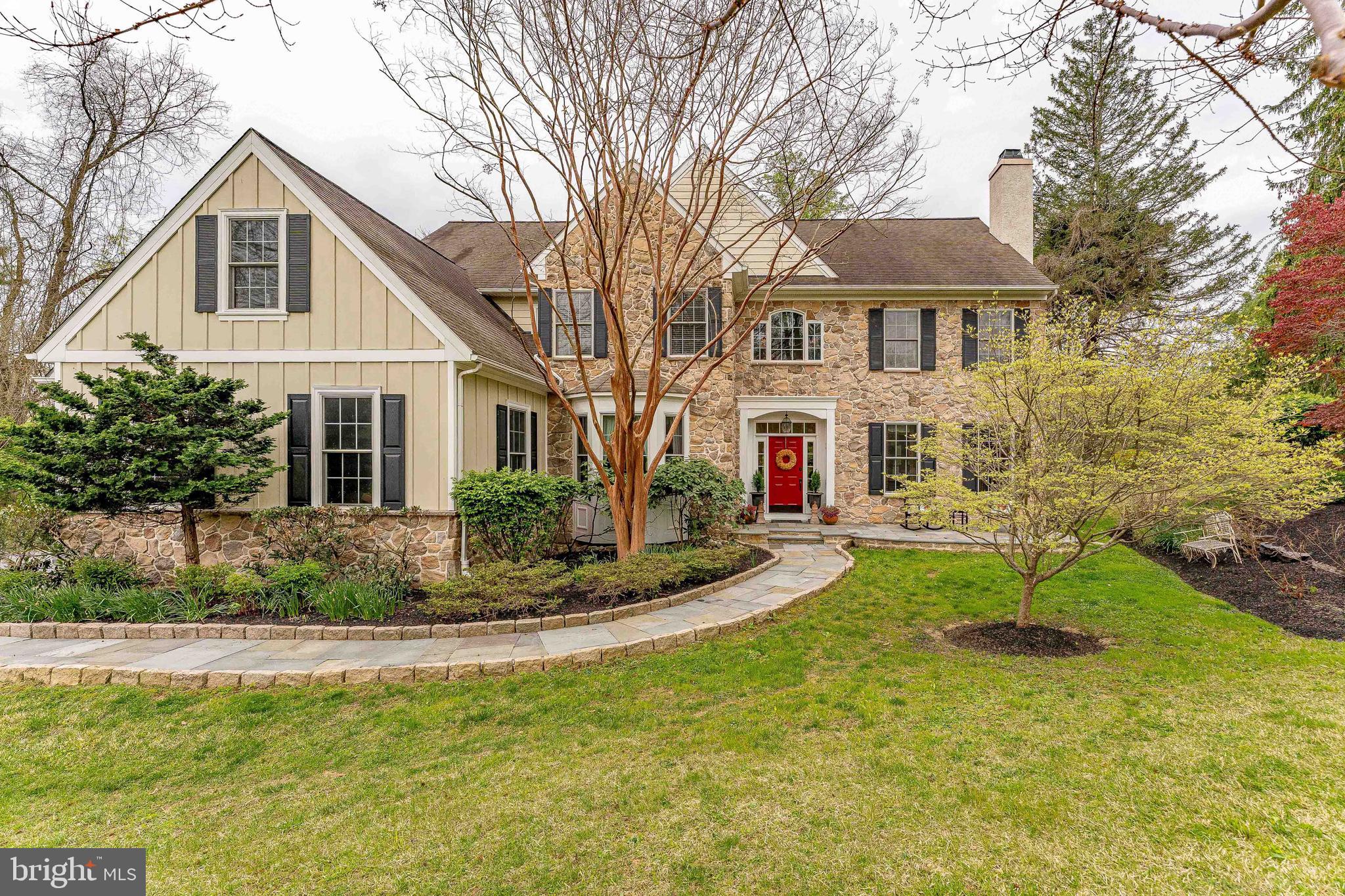 258 New Darlington Road Media, PA 19063 - Photo 2 of 120 a front view of a house with a yard table and chairs