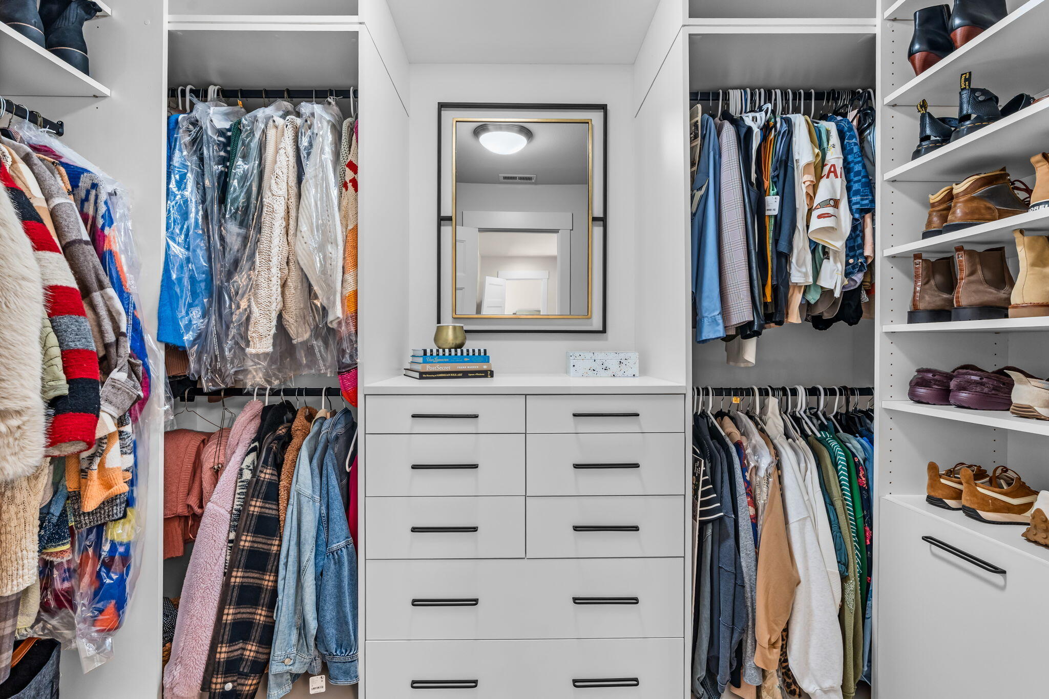 19985 Voltera Place Bend, OR 97702 - Photo 26 of 52 Primary closet with plenty of built-ins