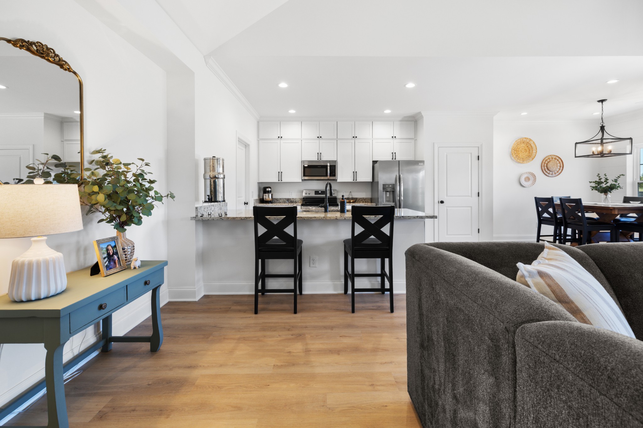 1314 Halls Mill Road Unionville, TN 37180 - Photo 6 of 35 a living room with furniture and a dining table with kitchen view
