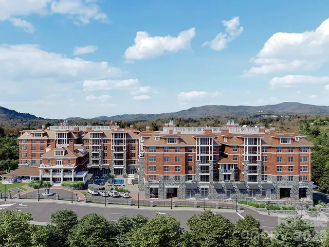 a view of a building with a lot of trees
