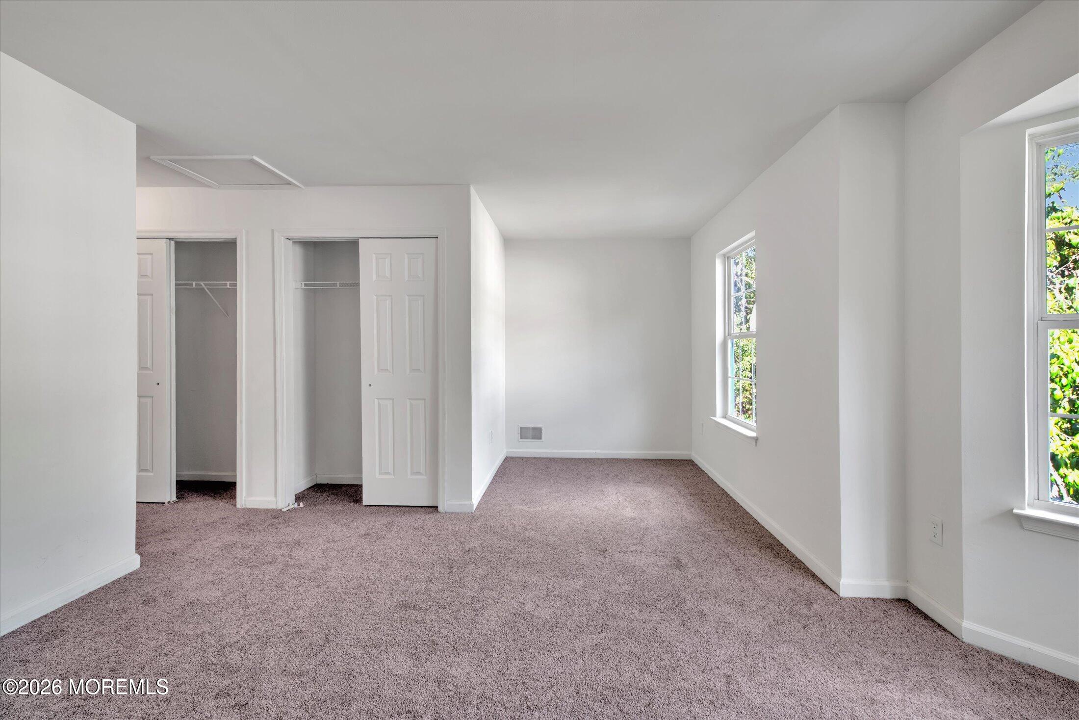 6 Esplanade Way Bayville, NJ 08721 - Photo 23 of 41 an empty room with windows