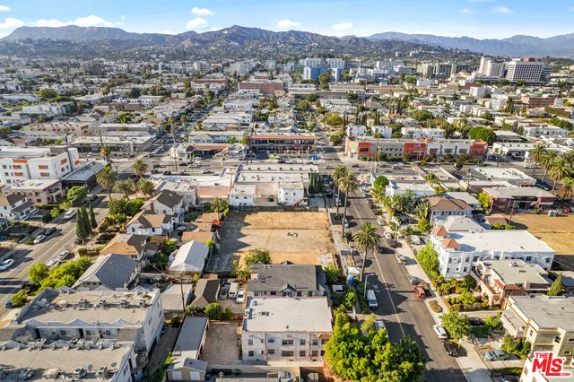 an aerial view of residential building and street