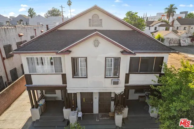 an empty room with closet area