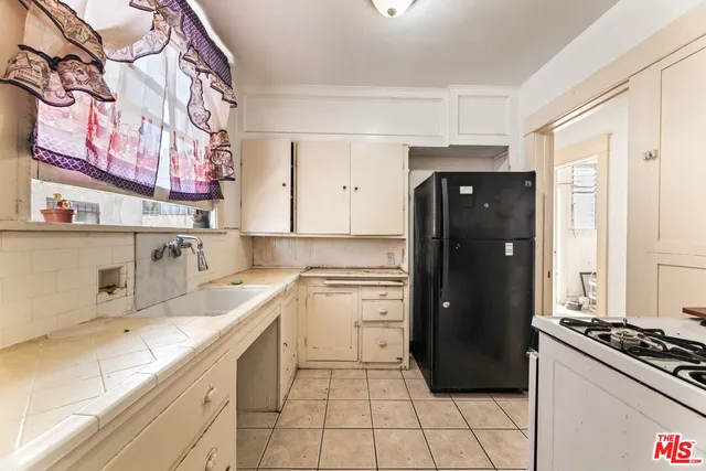 a view of a hallway with a white walls