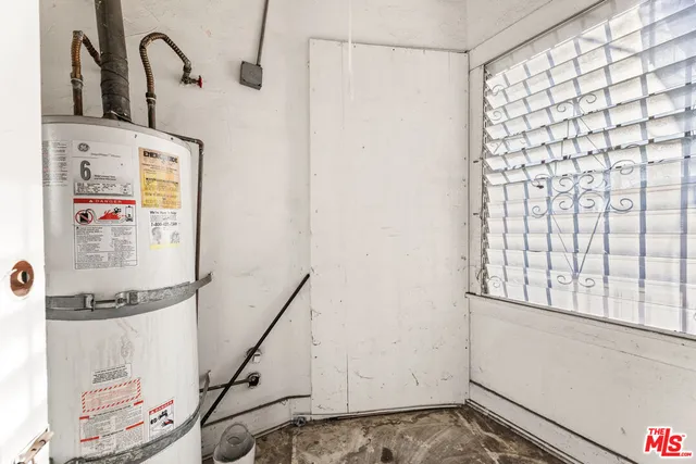a bathroom with a toilet and shower