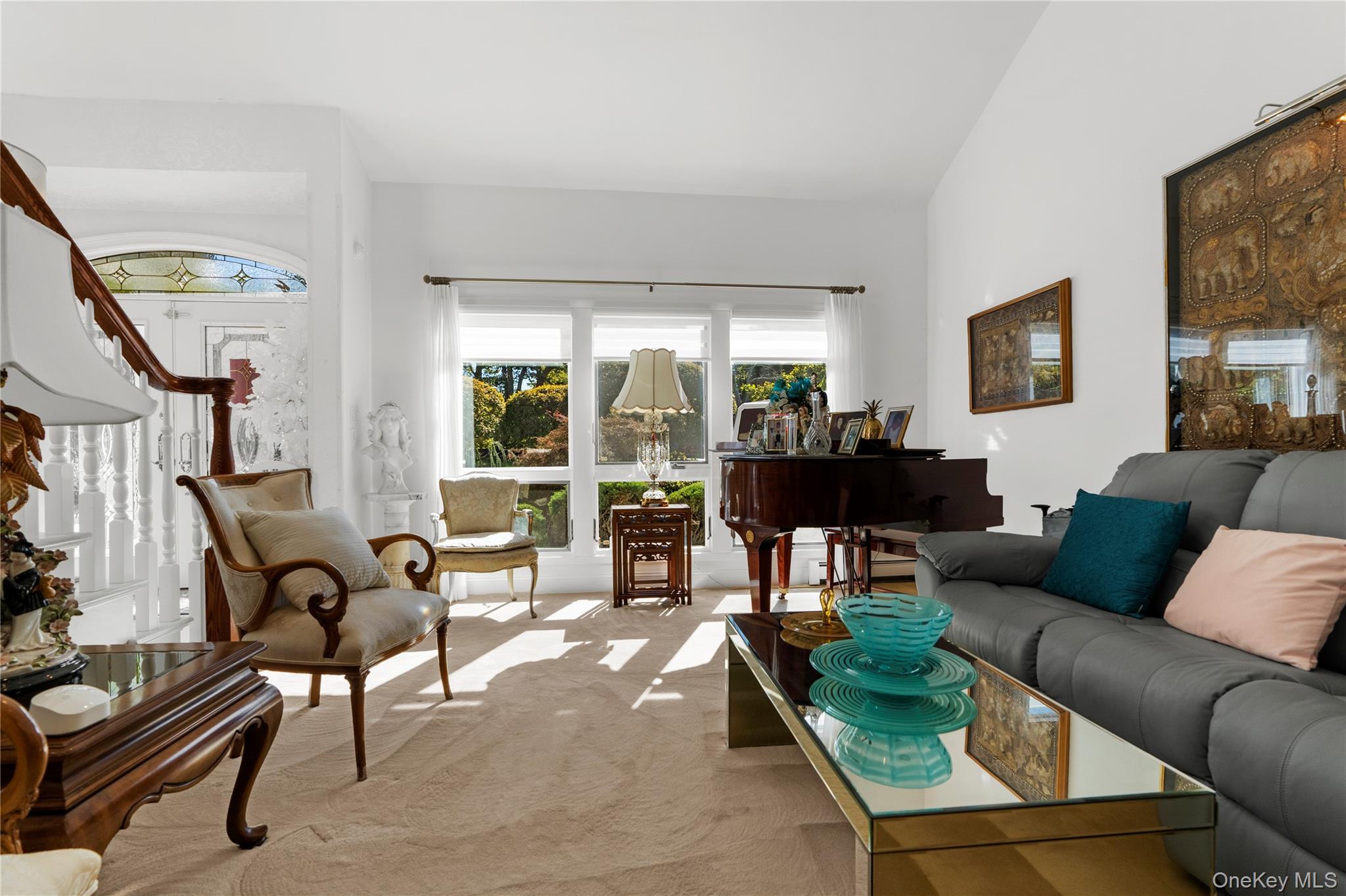 28 Annandale Road Commack, NY 11725 - Photo 12 of 29 a living room with furniture and a large window