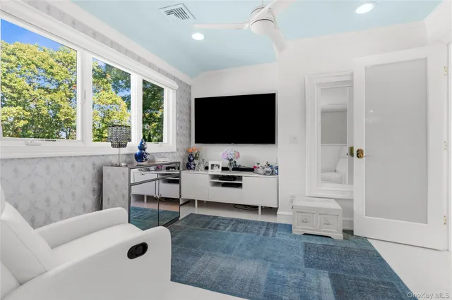 a bathroom with a granite countertop sink mirror and double