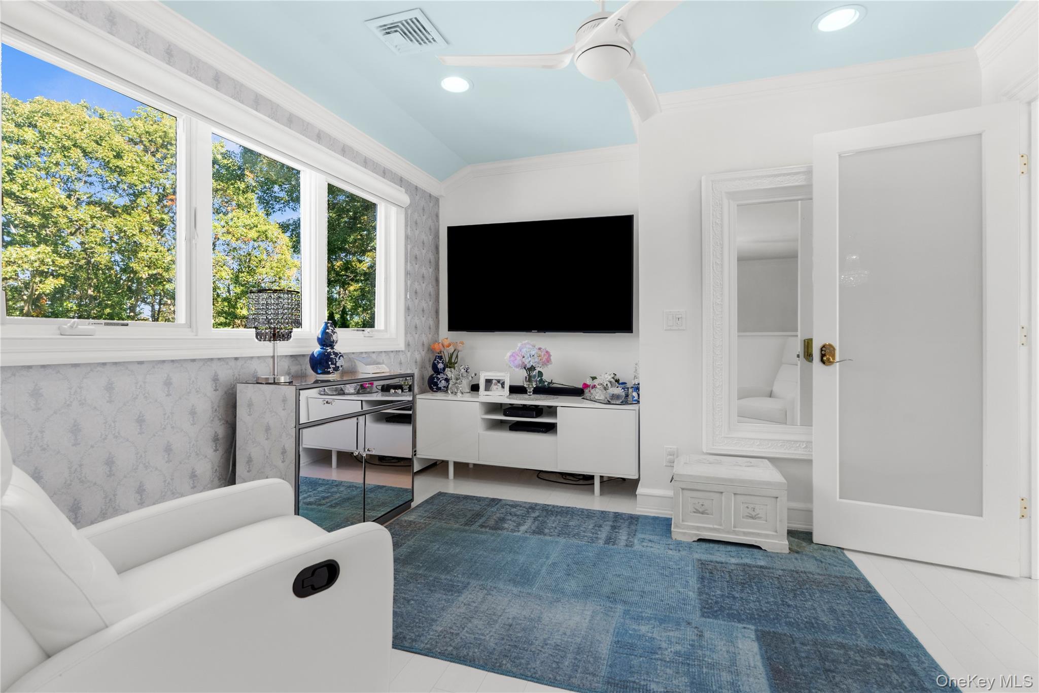 28 Annandale Road Commack, NY 11725 - Photo 15 of 29 a living room with furniture and a flat screen tv