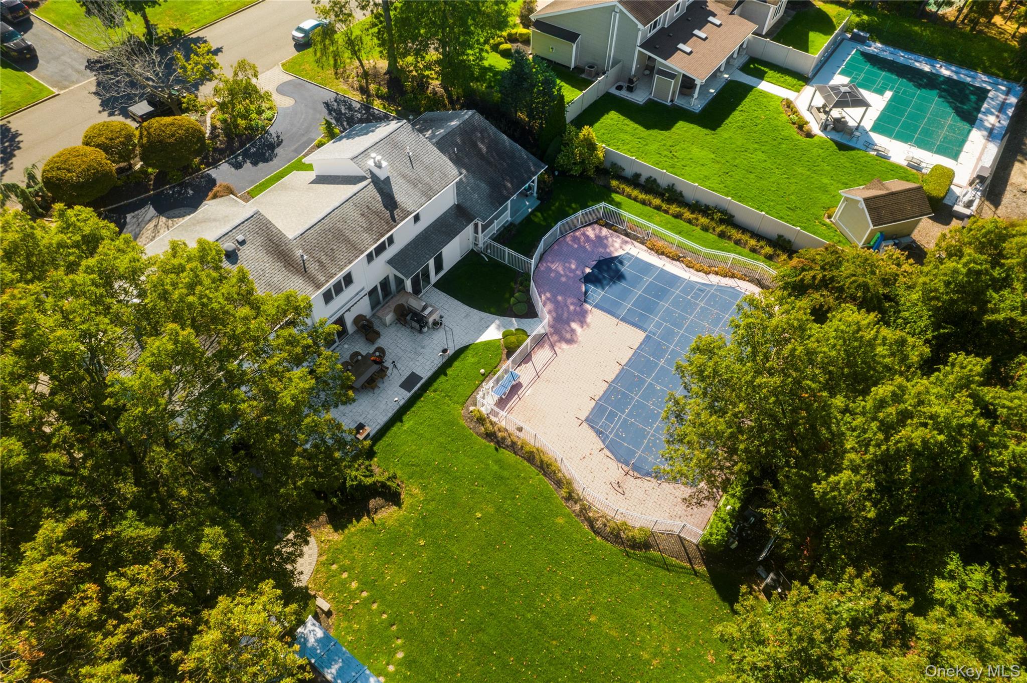 28 Annandale Road Commack, NY 11725 - Photo 27 of 29 an aerial view of a house with a yard