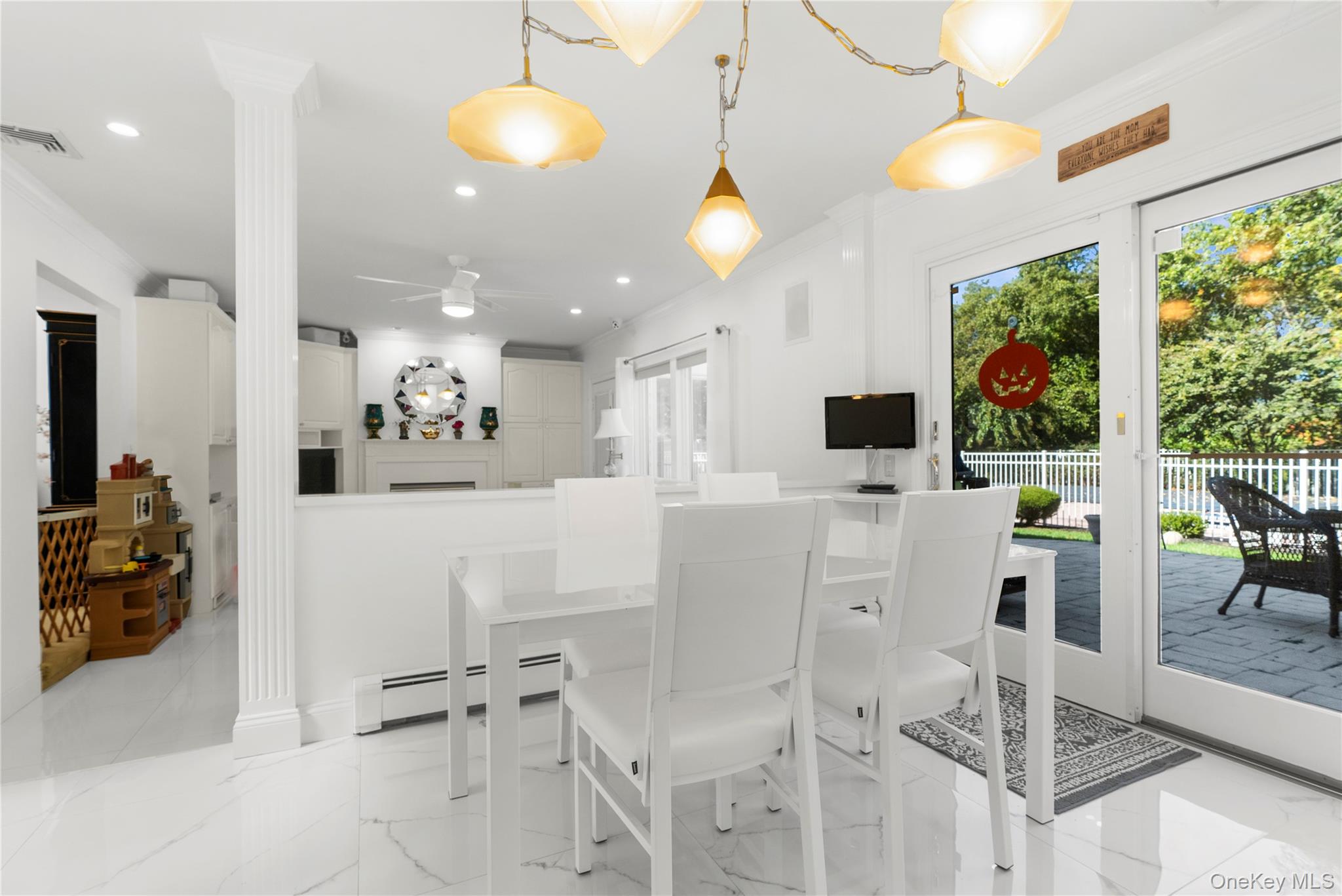 28 Annandale Road Commack, NY 11725 - Photo 7 of 29 a view of a dining room with furniture wooden floor and chandelier