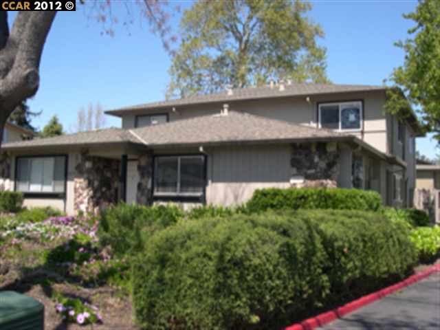 1371 Del Rio Court, Unit 3 Concord, CA 94518 - Photo 1 of 1 a front view of a house with garden