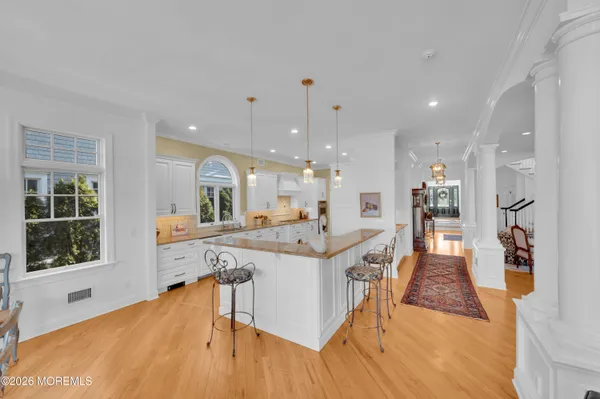 a utility room with sink dryer and washer